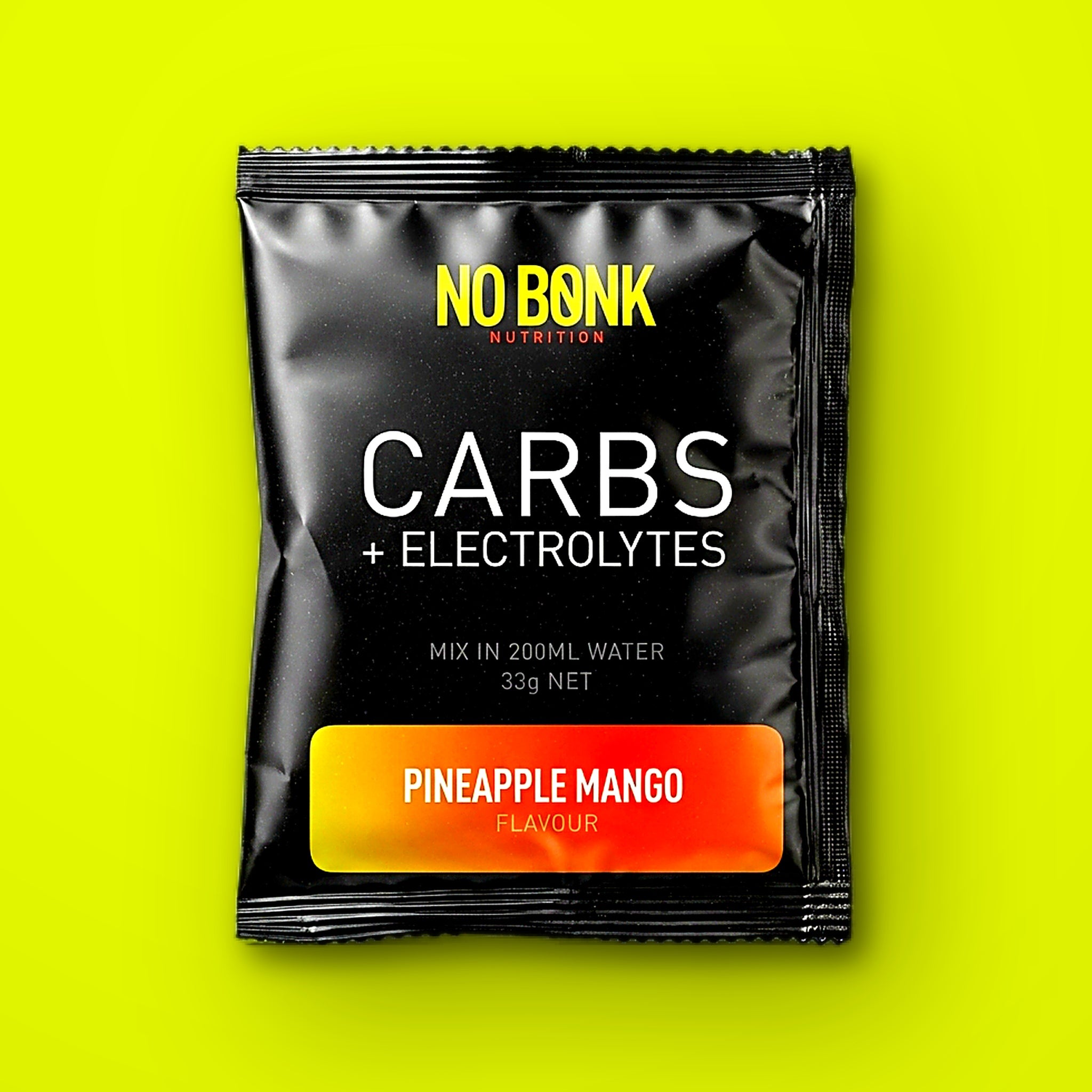 Close-up of a single NOBONK Pineapple Mango sachet on a chartreuse background
